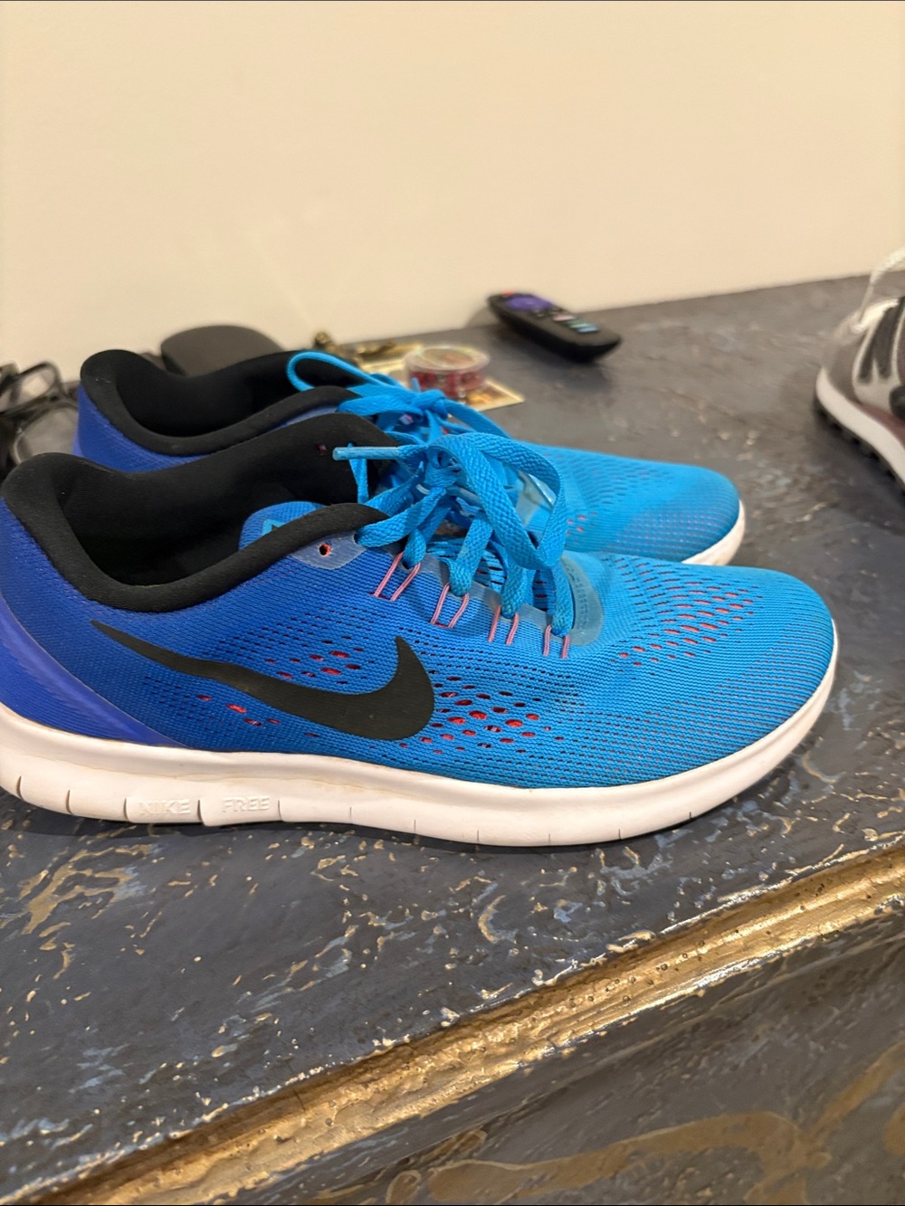 Nike Women's Bright Blue Athletic Running Shoes with Black Swoosh